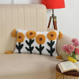  Tufted cushion cover with yellow sunflowers, black stems, textured knit design, rectangular 12x20 inch pillow.