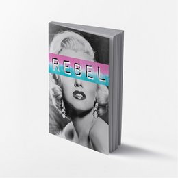 Black and white photo of Marilyn Monroe with the word "Rebel" in pink text overlaid on the image. This is a notebook or journal cover featuring a classic portrait of the iconic actress.
