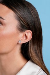 BLUE AND SILVER ZIRCONIA HAND OF FATIMA EARRINGS