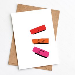 A red, orange, and pink heart-shaped card with the text "I Heart You" on a white background.