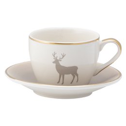Cream ceramic cappuccino cup with deer silhouette design, gold rim, matching saucer included.