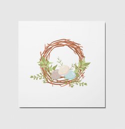 Decorative Easter wreath with eggs and greenery, perfect for Easter cards and decor.