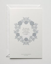 Elegant condolence card with floral wreath design and sympathy message. Suitable for expressing heartfelt condolences.