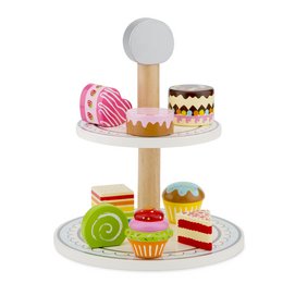 A multi-tiered serving stand displaying an assortment of colorful, whimsical cakes and pastries. The stand features a variety of shapes, textures, and decorative elements, making it suitable for a child's play kitchen or tea party.