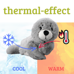 Soft, cuddly gray plush seal toy with large eyes and a friendly expression.