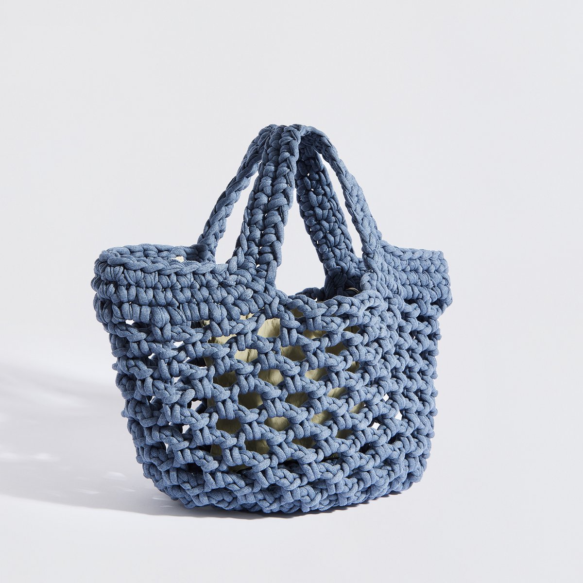 “Ingrid” gehaakte mandtas met waterdicht etui denimblauw