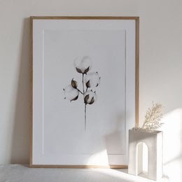 Cotton wall art in various sizes, featuring a minimalist botanical illustration of cotton bolls in black and white.