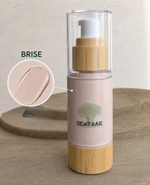 Liquid mineral foundation, light pink bottle, bamboo dispenser, natural SPF, complexion care