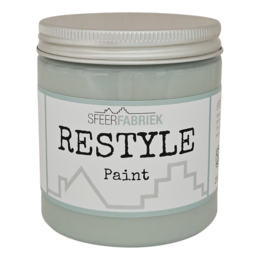 Vintage green paint in a jar. The paint is a soft, muted green color with a chalky, matte finish. It appears to be a high-quality, specialty paint product suitable for furniture, home decor, or DIY projects.