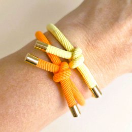 Goldenes Knotenarmband Neonorange