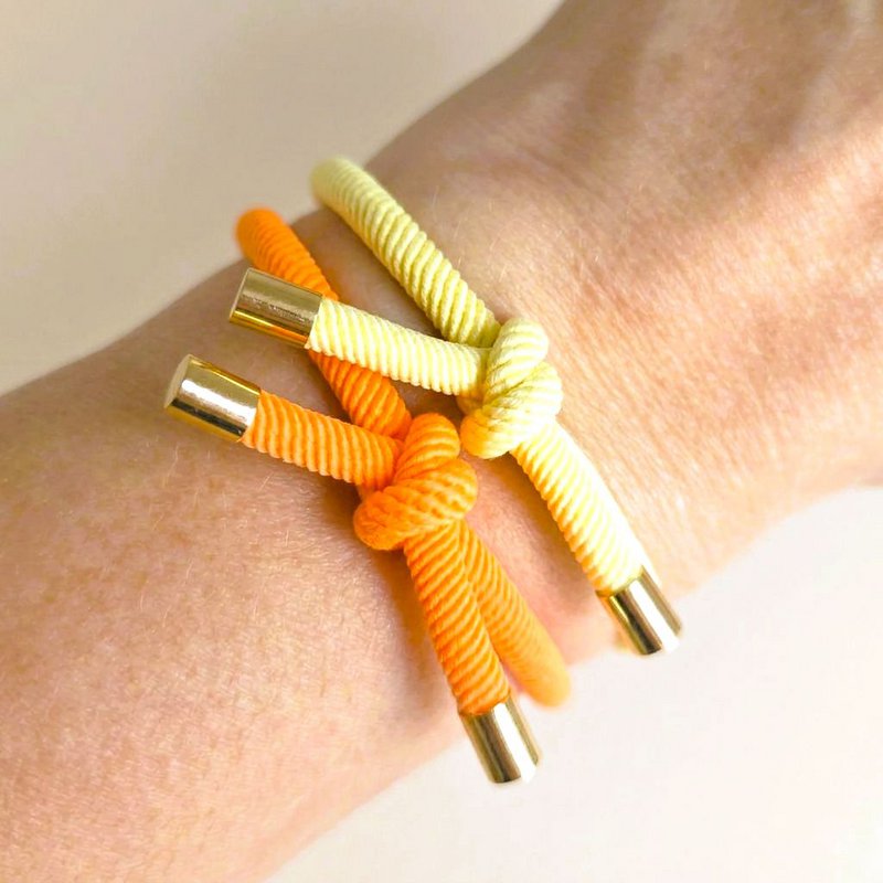Goldenes Knotenarmband Neonorange