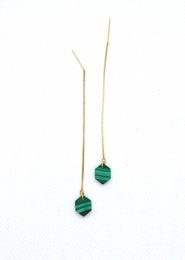 Elegant gold-toned drop earrings featuring marquise-cut malachite stones in a vibrant green hue.