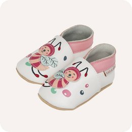 Soft leather baby slippers with a cute bee design, available in sizes 0-6 months to 3-4 years. The slippers feature a pink and white color scheme with a playful bee motif.