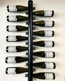 Large black metal wine rack with space for 12 wine bottles.