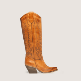 Tan leather texan cowboy boots with embroidered western details, knee-high tall boots for women.