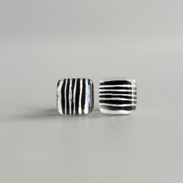 Tiny  black white striped earrings with sterling silver posts