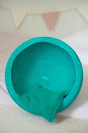 Colorful sensory beanbag filled with cherry pits, suitable for tactile stimulation and sensory play.