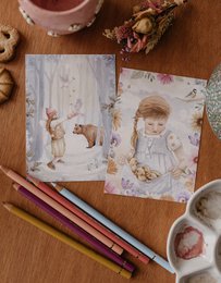 Ragazza da cartolina con anatre