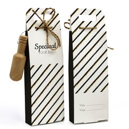 A body scrub in a wooden scoop with a striped gift box. The scrub appears to be a white or light-colored exfoliating salt product. The packaging and presentation suggest this is a premium or special occasion body care item.