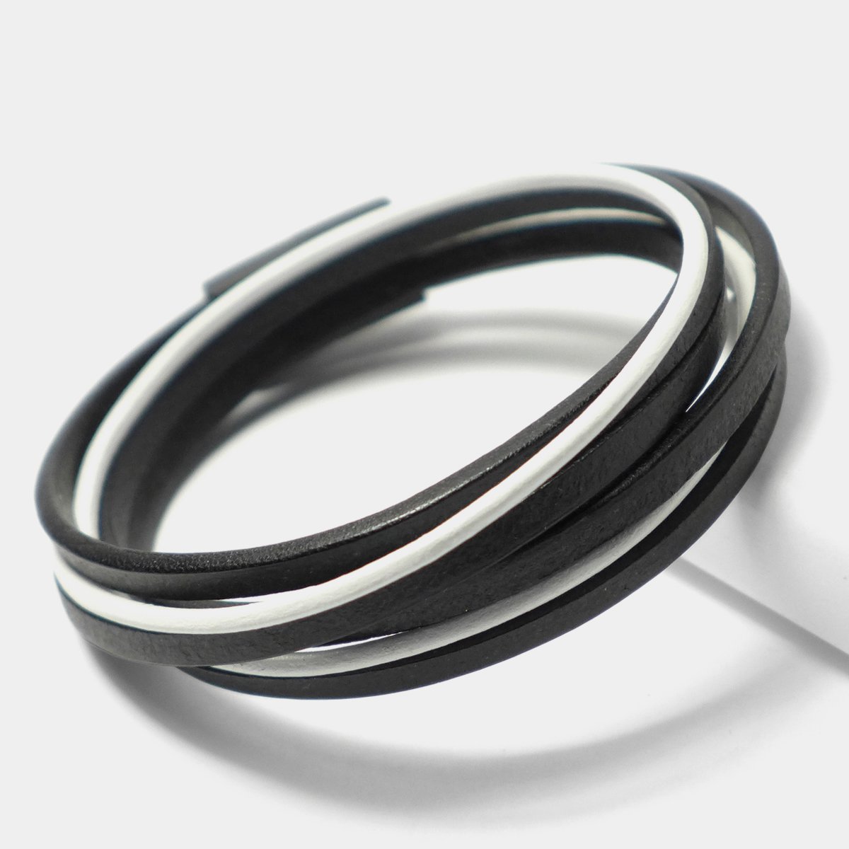 Leather Star PG72 - men's bracelet made of black and white leather with a black magnetic closure