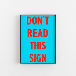 Vibrant wall art print with bold text "Don't Read This" in red and blue colors, suitable for modern home decor.