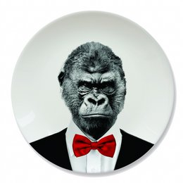  "Mustard Wild Dining Gorilla - Kids Plate featuring a stylized gorilla wearing a tuxedo and bowtie, with a plate of hot dogs or sausages on its head."