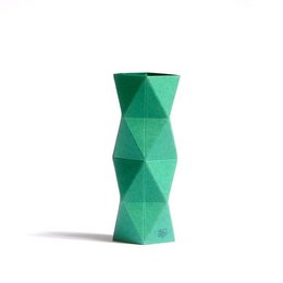 A small, geometric green vase with a unique triangular pattern. The vase is designed to hold a single flower or small arrangement.