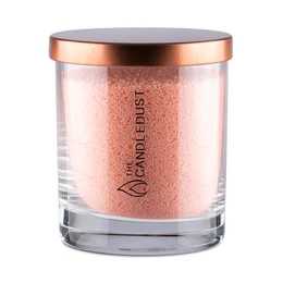 Peach-scented candle in a glass container with a copper-colored lid. The candle is round and tall, with a warm, inviting color.