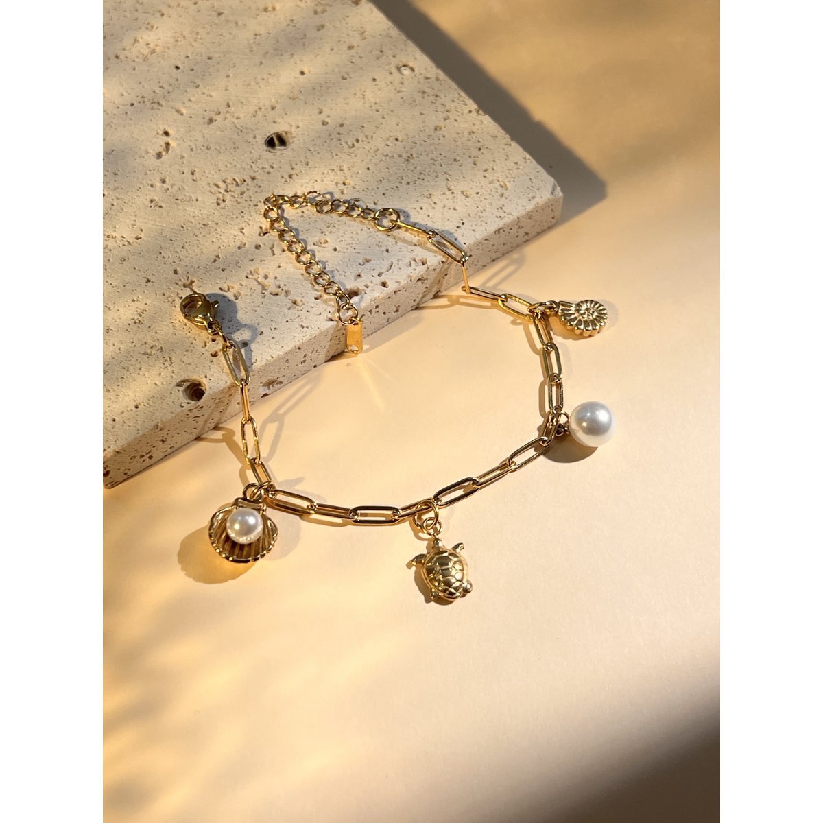 Busy shell bracelet, sea star and pearl