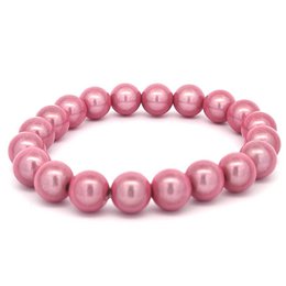  A pink beaded bracelet with round, glossy beads. The bracelet has a simple, elegant design and appears to be made of high-quality materials.
