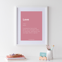 A pink A3 poster with the word "Love" and a definition of love in text.