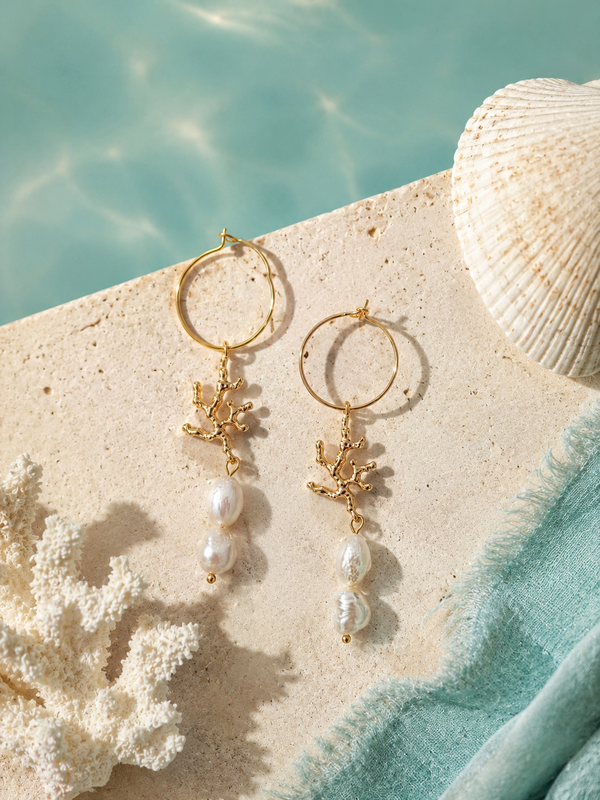 Les boucles d’oreilles Coral Whisper