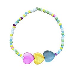  Colorful handmade bracelet with pastel-colored heart-shaped beads, made in Nepal.