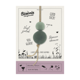 Colorful greeting card with 10 lucky doll figurines in various pastel shades.