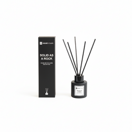 A solid black reed diffuser with a 50 ml capacity, designed for home fragrance.