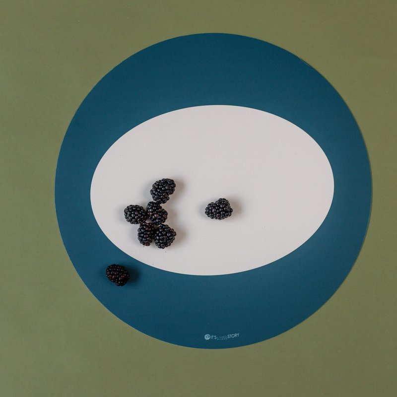 Farverig og original rund dækkeserviet Rund Eclipse Blue