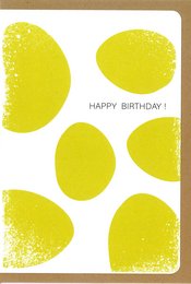A yellow and white greeting card with the text "HAPPY BIRTHDAY!" and several yellow oval shapes resembling lemons or eggs.
