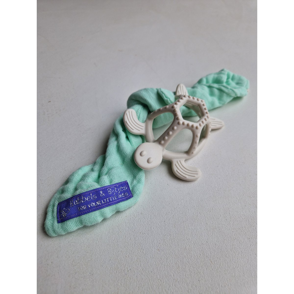 Anneau de dentition tortue blanc avec tissu vert
