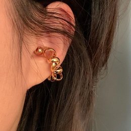 Pièce à oreille de conception de fil unique