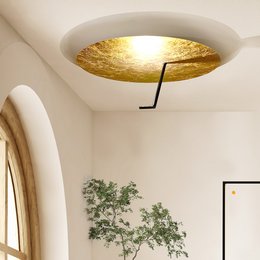 A modern, circular LED wall and ceiling lamp with a gold-colored reflective surface, available in various sizes.
