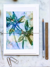  Watercolor painting of a gloriosa flower in mild green tones.