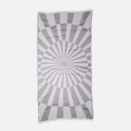 Gray and white checkered optical illusion pattern towel with radial sunburst design.