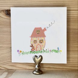 Tarjeta de la casa del huevo de Pascua
