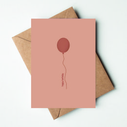 Greeting card with a simple balloon design in a pink color. Suitable for birthday celebrations.