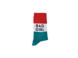 Black and white sneakers with "Bad Girl" text on socks, suitable for kids.