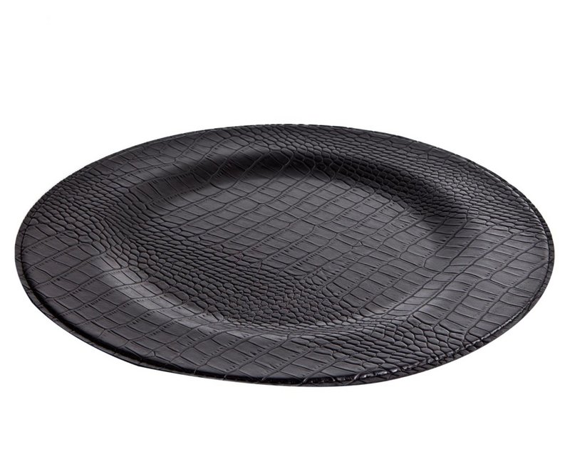 Zwart krokodil rond bord