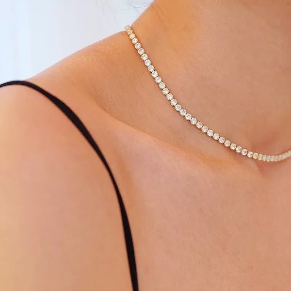 Tijdloze Rivière-chokerketting met diamantlook