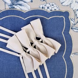 Alabaster white velvet bow-shaped napkins, set of 4, elegant formal dining accessory with decorative knot design.