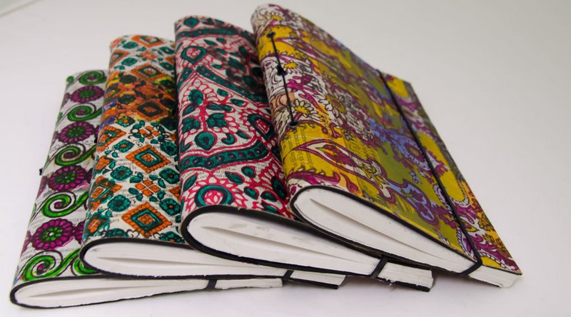 YLANG-YLANG NOTEBOOK IN AIR CHAMBER AND PRINTED NEWSPAPERS