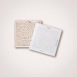 Wooden puzzle with a complex maze-like design, suitable for challenging puzzle enthusiasts.